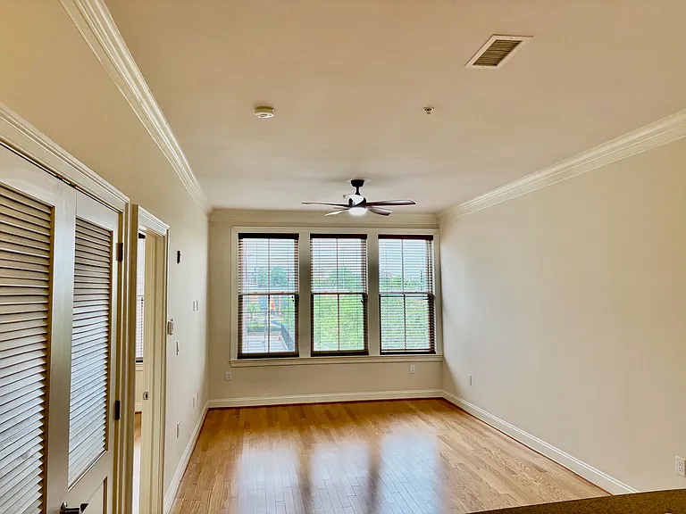 Large Open Living Room w/ Large Windows.