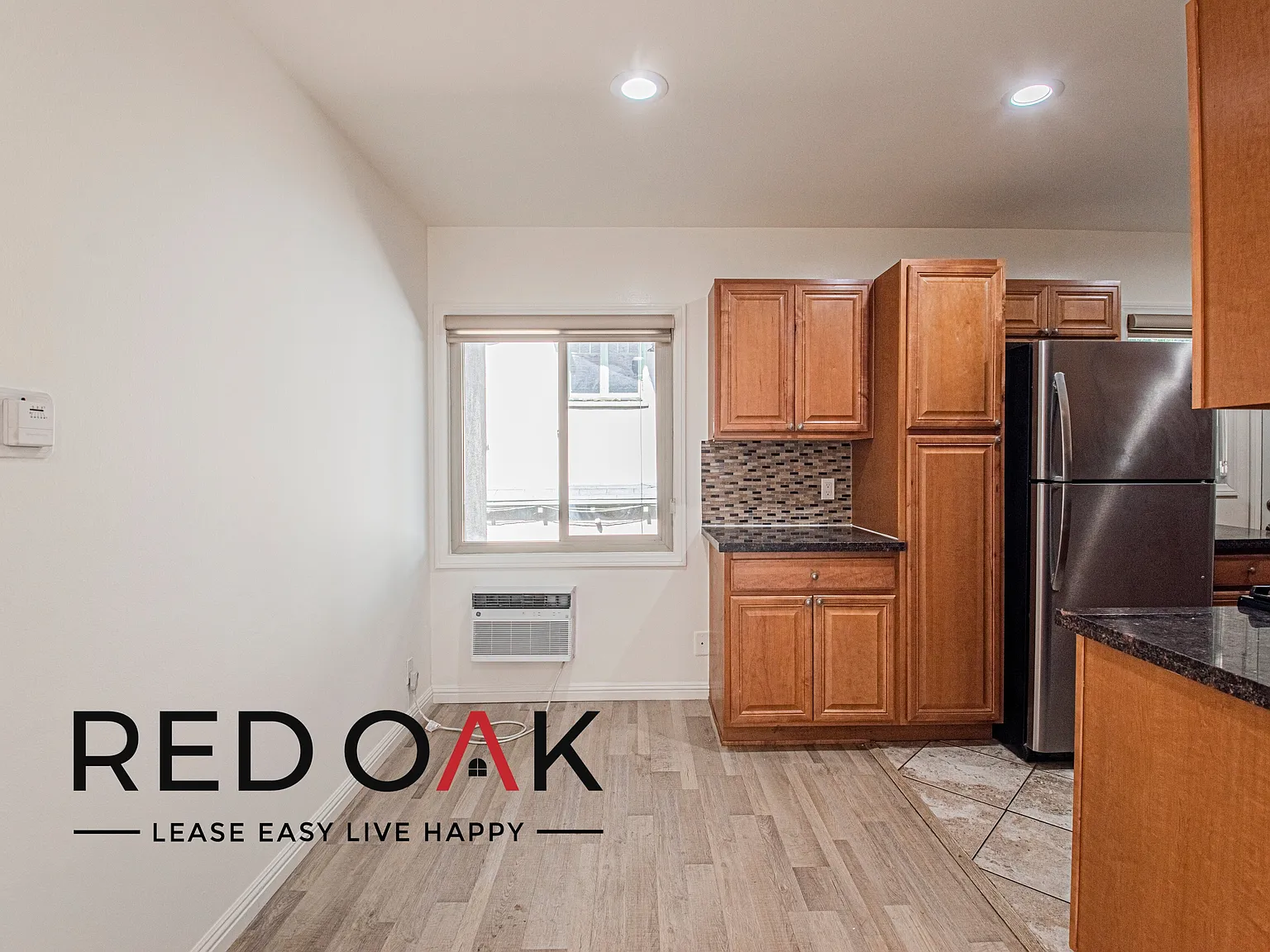 Sophisticated One Bedroom with Hardwood Style Floors, Eat-In Kitchen Space, and On-Site Laundry ~... — Photo 4