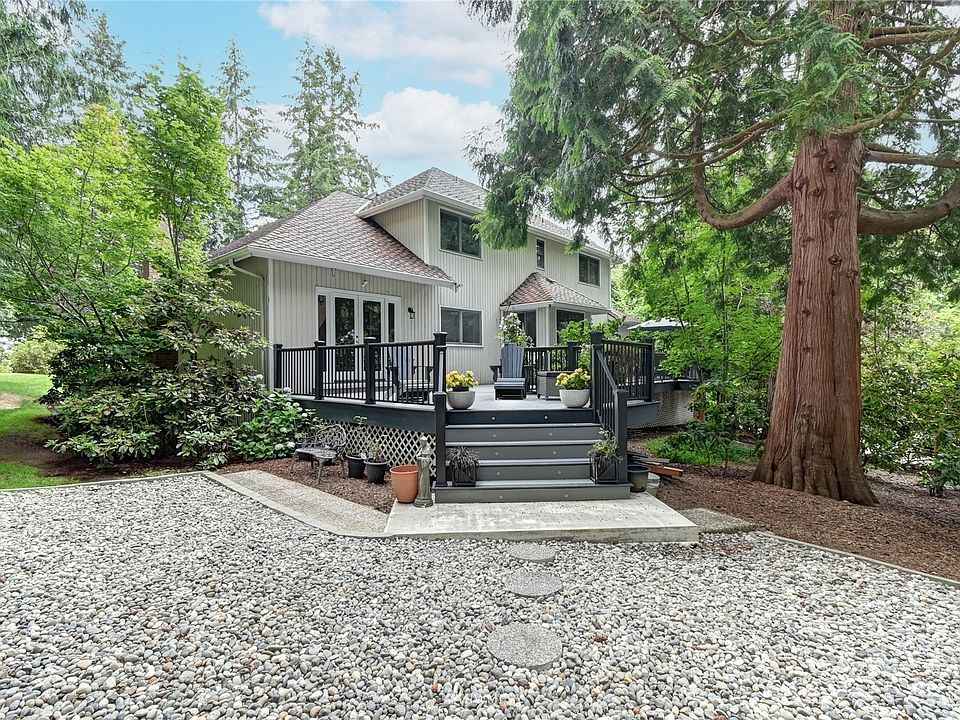 View from the golf course. Beautiful home from every angle!>
