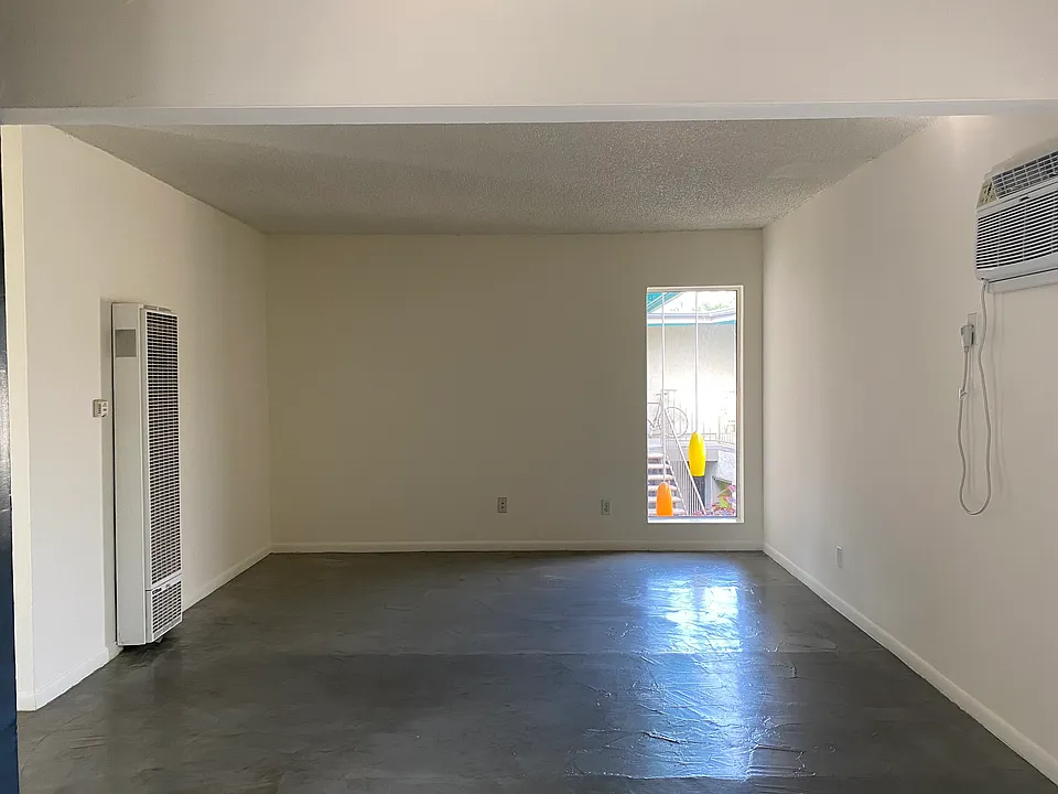 living room with ac & heat