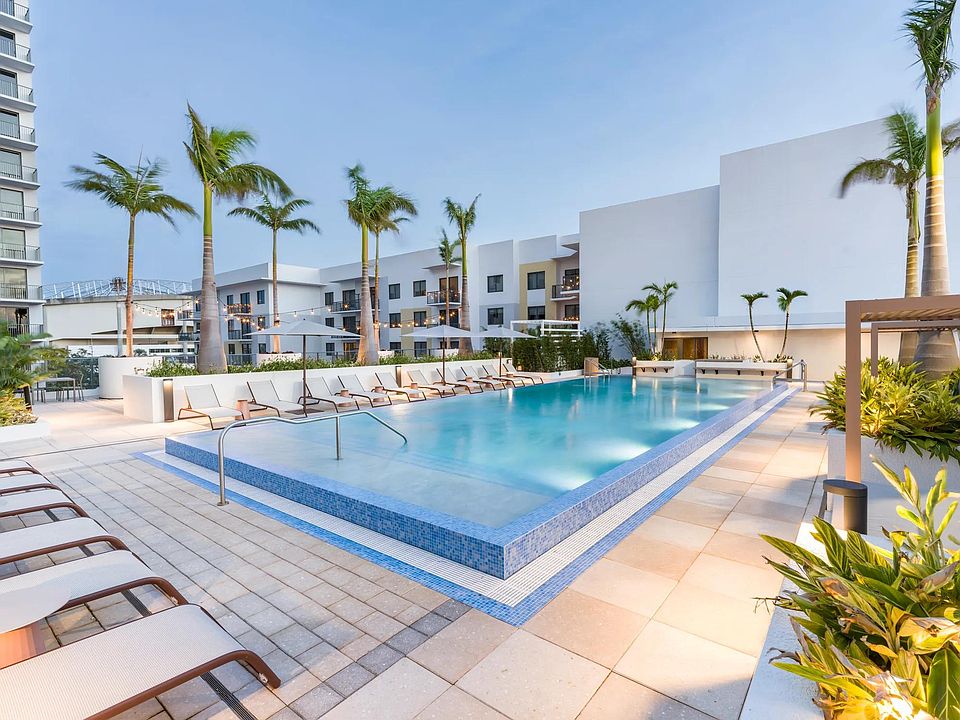 Unwind by the pool with cabanas and lounge seating for the perfect escape.
