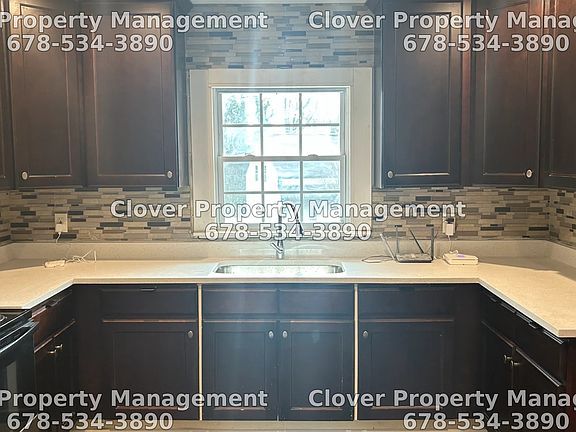 Granite countertops and brand new appliances (Oven, Range, Microwave, Refrigerator with Freezer)