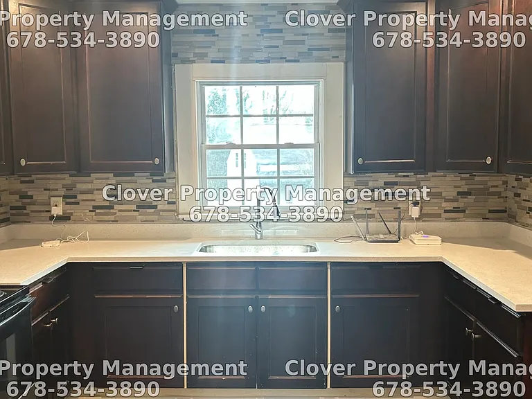 Granite countertops and brand new appliances (Oven, Range, Microwave, Refrigerator with Freezer)