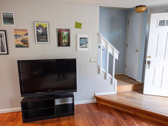 Stairs to second level bedrooms near front door