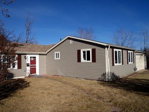 New roof gutters siding windows shutters and doors