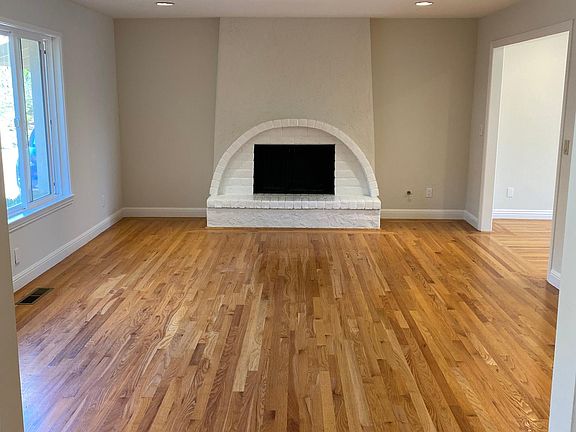 Sunny living room with gas fireplace