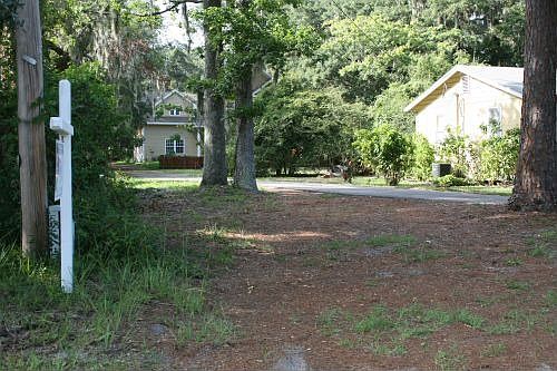 front of prop next door