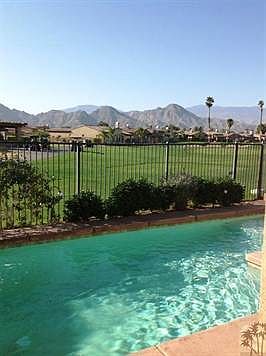 View from Master Bedroom area toward the golf course and mountains.