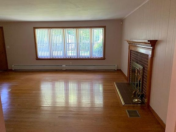 Large living room with lots of light.