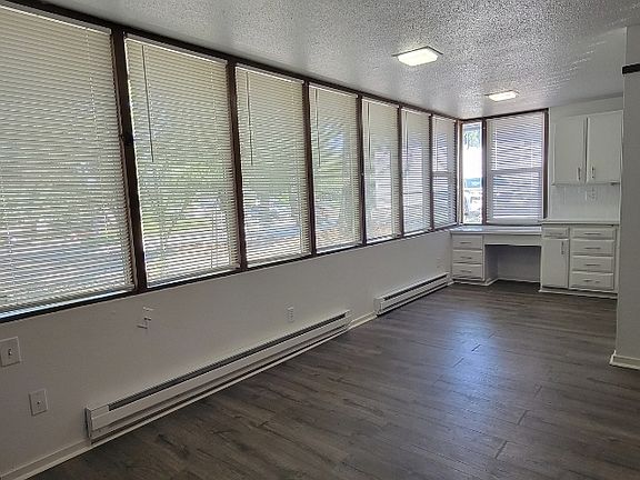 Security Screen door opens out to patio