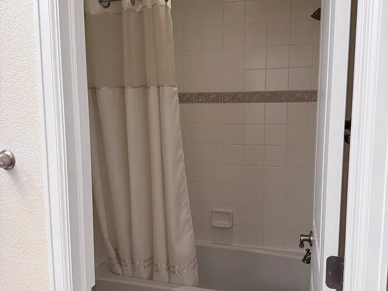 Upstairs full bathroom, includes two sinks and a bathtub/shower
