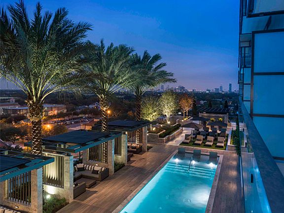 Elevated pool deck with private poolside cabanas