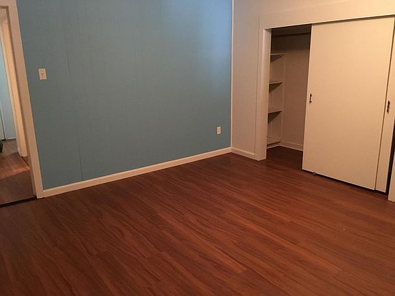 Large master bedroom with a ton of closet and storage space.