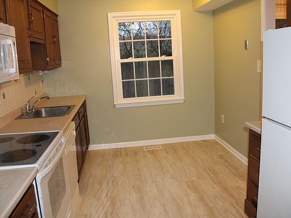 New microwave, stove and flooring on