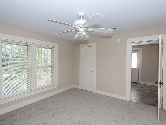 Large (13.5 x 13.25) Bedroom with ceiling fan. Lots of natural light.