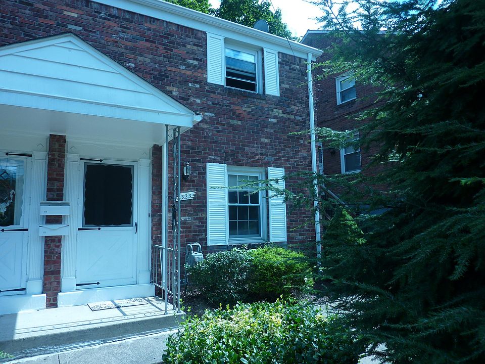 Front of duplex. 323 on right.
