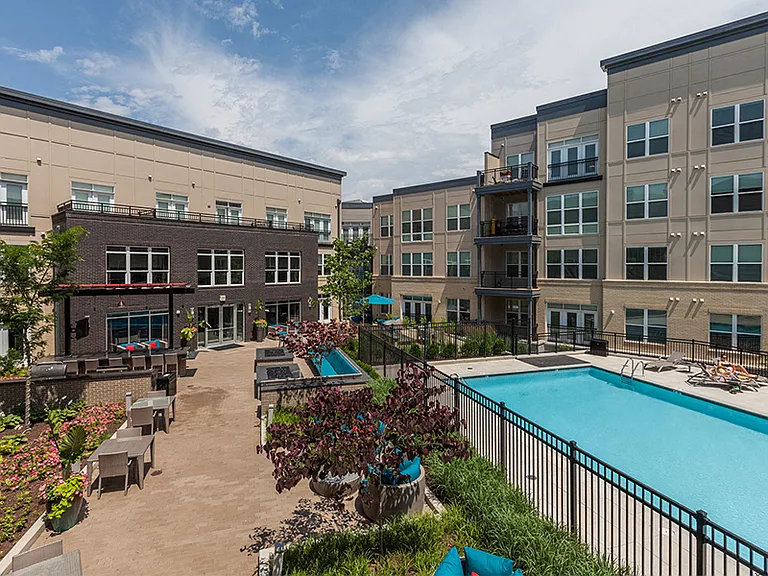 Our resort-style swimming pool features a sundeck and cabanas