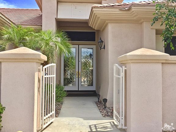 Private Courtyard Leading to Leaded-Glass, Double-Door Entry