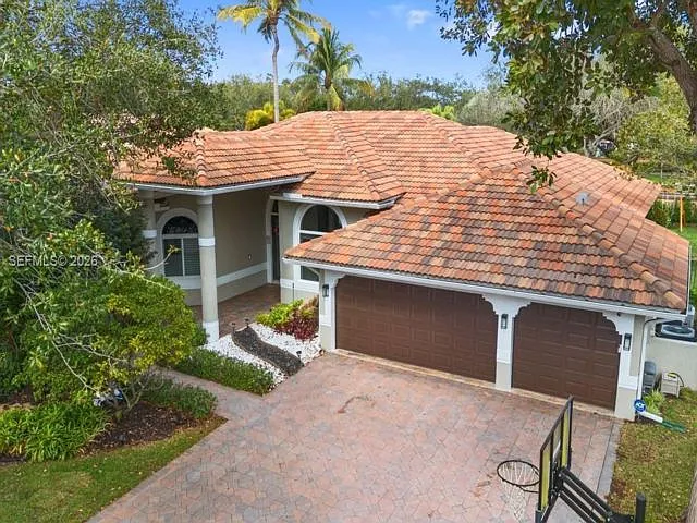 12123 NW 10th Mnr — Photo 1