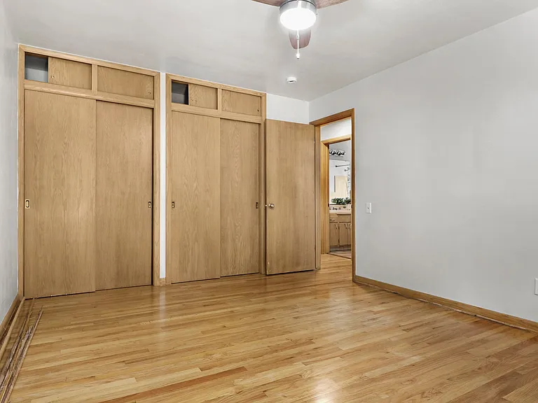 Another view of this pretty and spacious bedroom with the private patio!