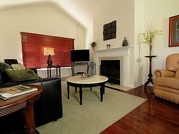 This living room is a terrific gathering place with so many options for seating arrangements! The co