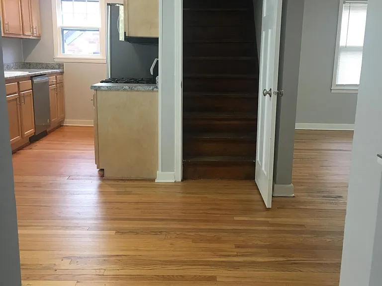 Hallway from bedrooms looking into dining room/kitchen