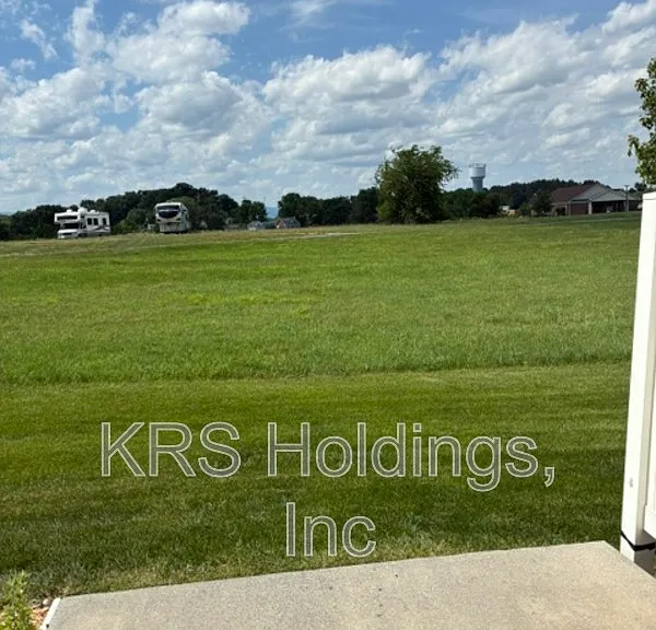 303 Joyce Dr — Photo 2