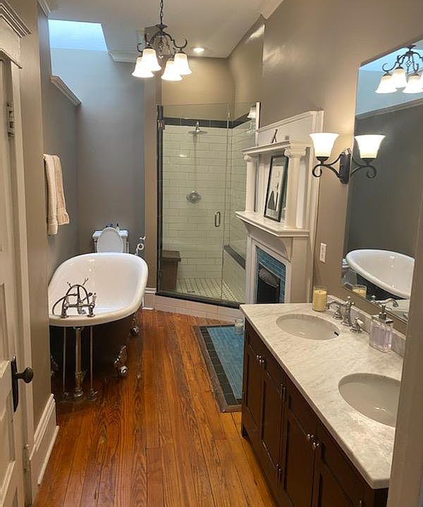 Large bathroom private to the main bedroom with double vanity, soaker tub, walk-in shower and a SECOND walk-in closet