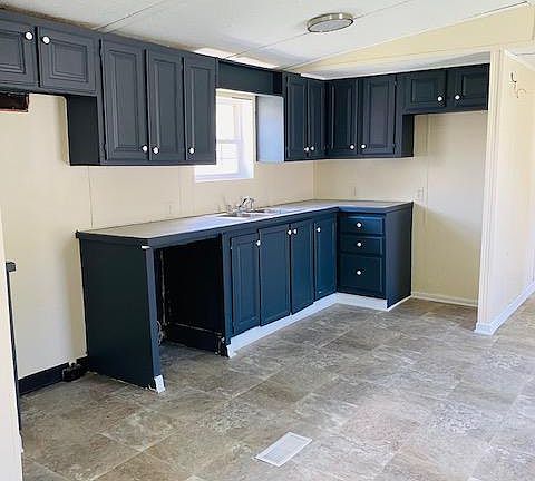 $34,500.00 for home then $305 per month - Kitchen