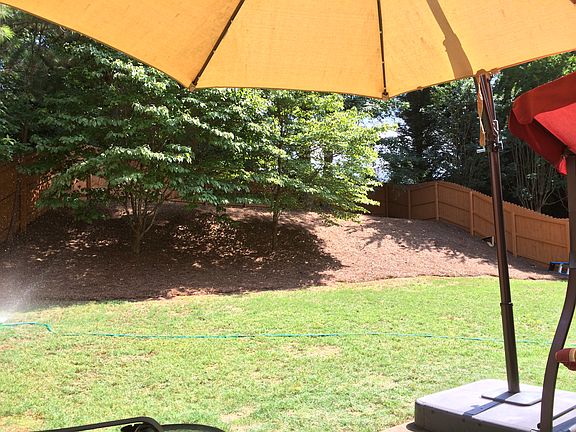 Private fenced in backyard 