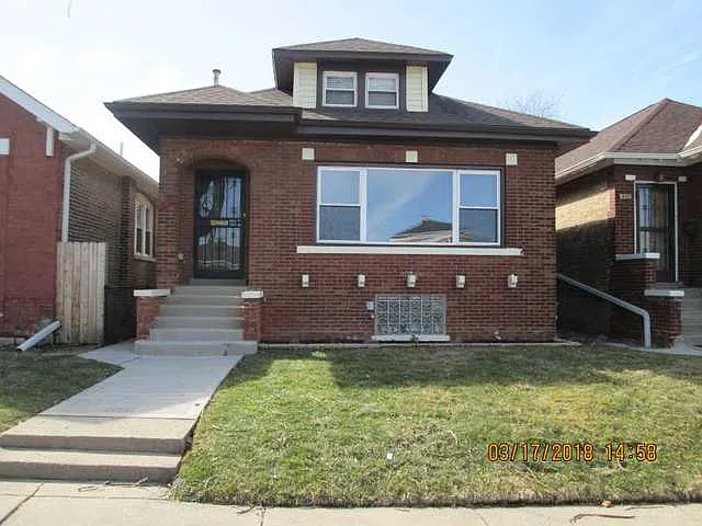 9318 S Prairie Ave photo 1