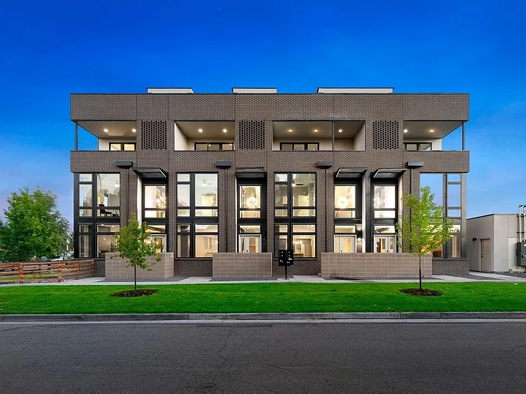 Front of 4 unit row homes, unit 2nd from right.