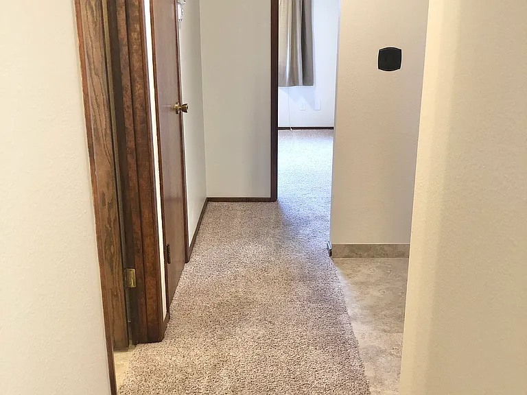 Hallway. Updated LVP Flooring not pictured.