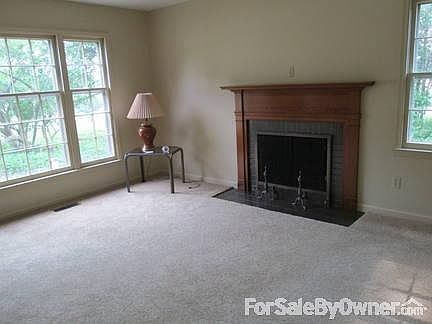 Living Room
						:
						New carpet, wood burning fireplace, beautiful view.