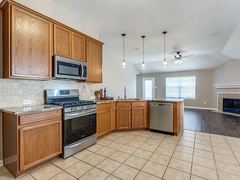 Large kitchen overlooking the living room