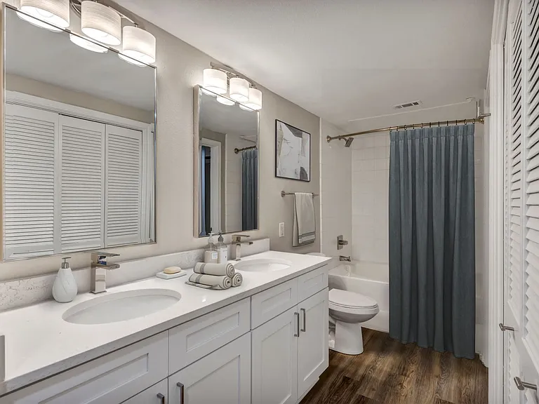 Renovated deluxe home featuring wood plank flooring and designer lighting fixtures