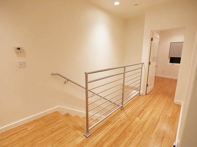 25. Third Floor Stairway Landing Down to Second Floor