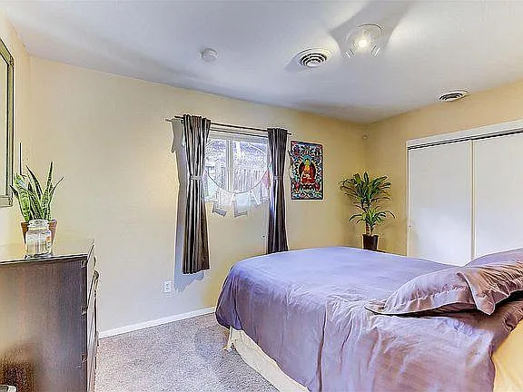 This room is freshly painted white April 2026