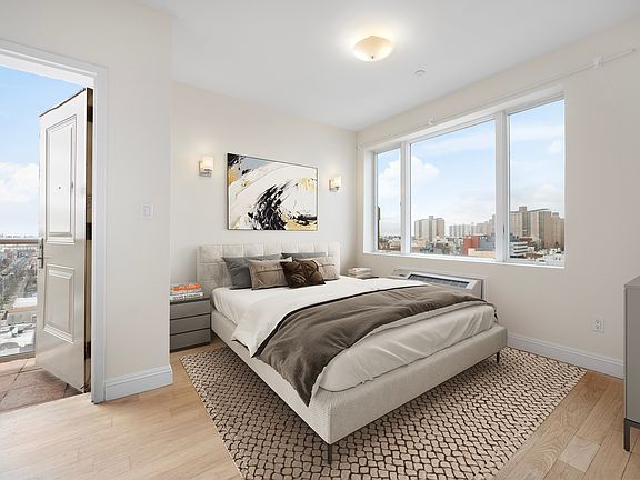 a bedroom with a large bed in a hotel room