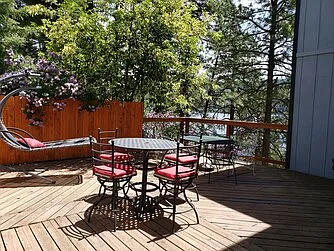 Private, main deck with view of Vallecito Reservoir and marina, seating for 10 and BBQ grill with propane burner.