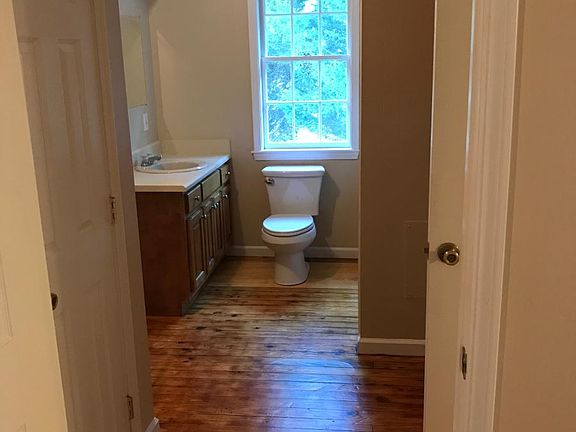 Bathroom/linen closet on left