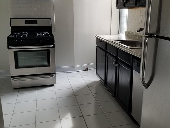 4th image of 155 60th St APT 15