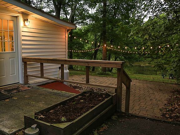 Enter by your raised garden.