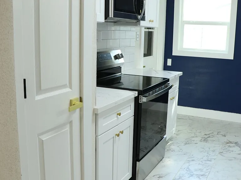 Stainless steel appliances with plenty of counter space.