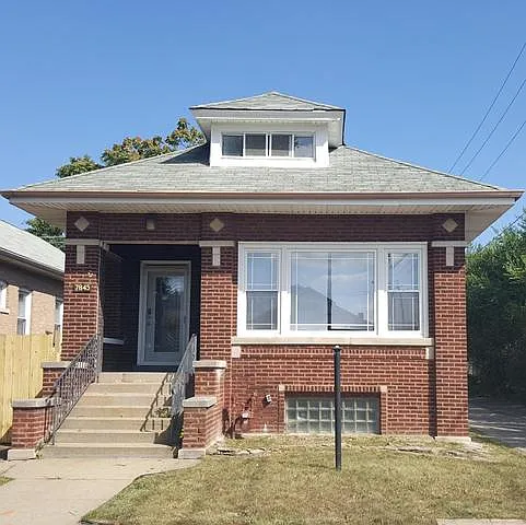 7845 S Merrill Ave photo 1