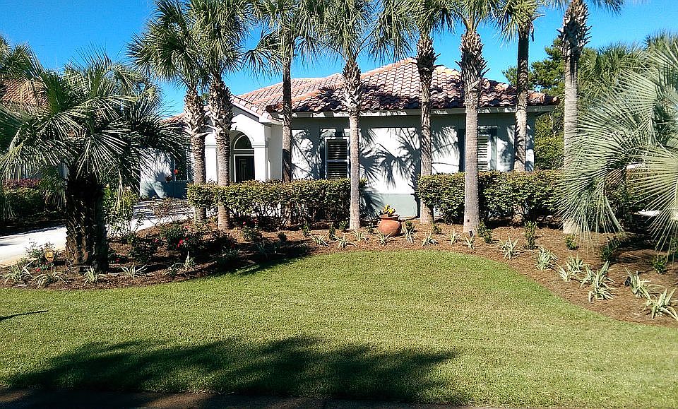 Front of home with landscapi