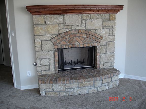 Beautiful oversized stone fireplace in living