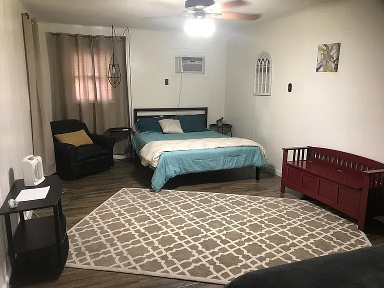 Enormous master bedroom. This is a queen size bed shown here.