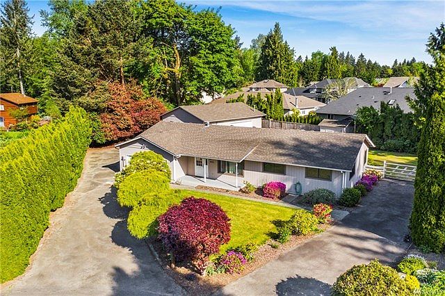 Well cared for rambler in sought after Olympia School District.  Large private lot on a cul-de-sac, 2 car garage + 1200 sf shop!!  What a rare find.