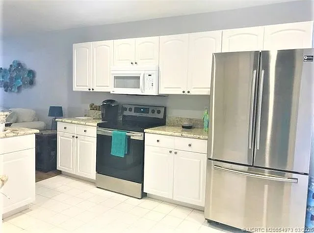3486 SW Pindo Palm Ln — Photo 9